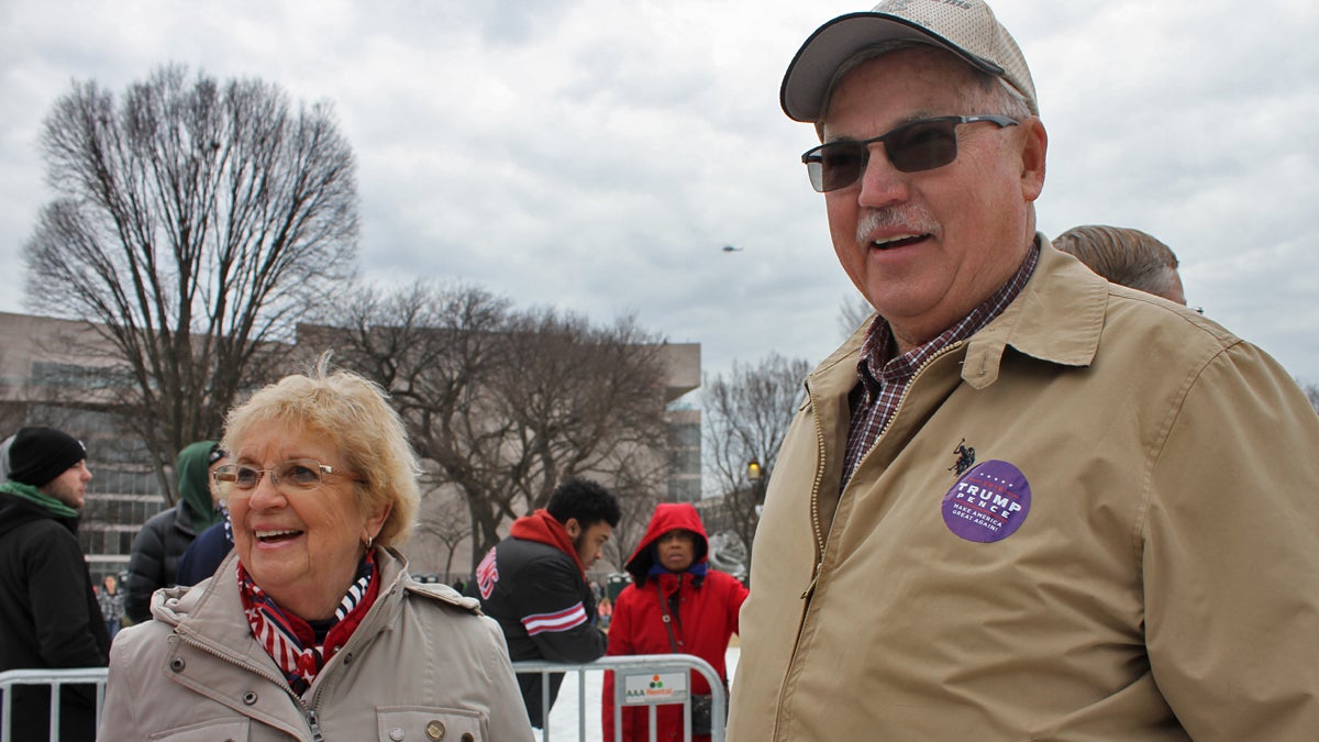  Marian and Phil Spotts chat with their family on the National Mall during Inauguration Day on Friday, Jan. 20, 2017 in Washington D.C. They traveled by bus from Erie to D.C. to see President Donald J. Trump take the oath of office. (Margaret Krauss/WESA) 