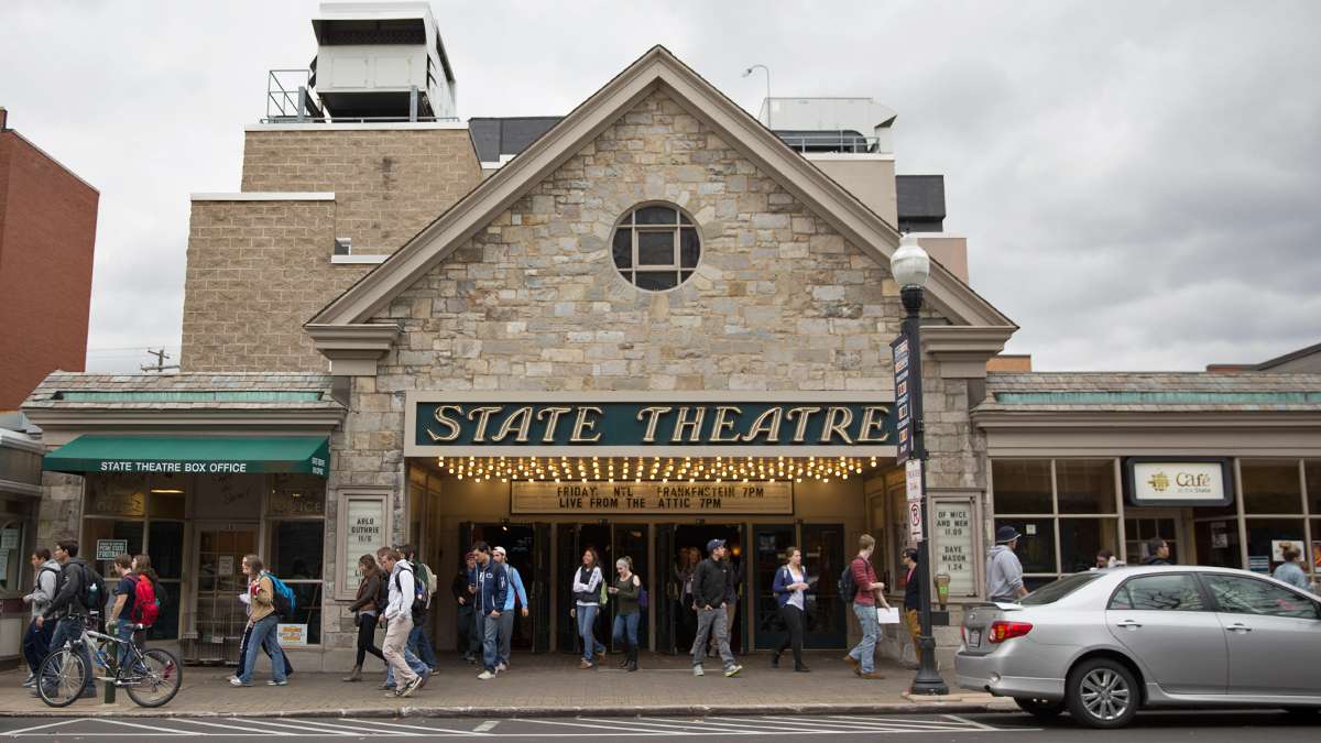 Students exit The State Theater after a matinee show. The theater closed for five years and was reopened after renovations in 2006 as a community performance venue. (Lindsay Lazarski/WHYY)