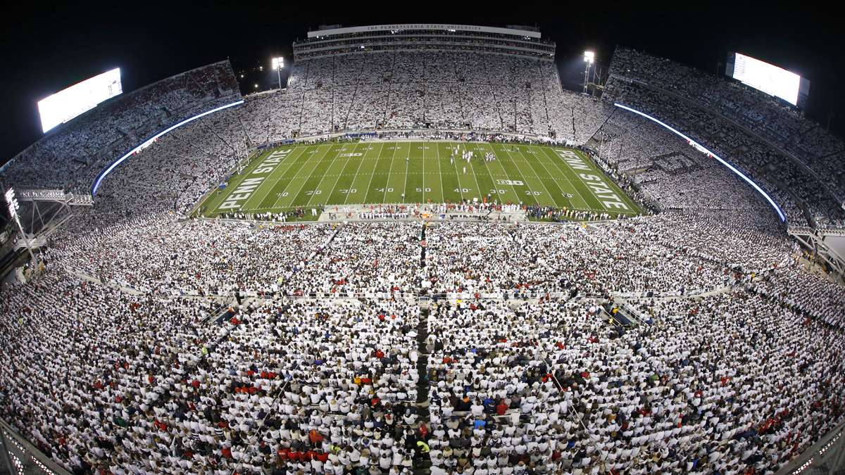 A sellout crowd wears mostly white, as part of a 'white-out' during a recent football game between Penn State and Ohio State at Beaver Stadium. (AP Photo/Gene J. Puskar)