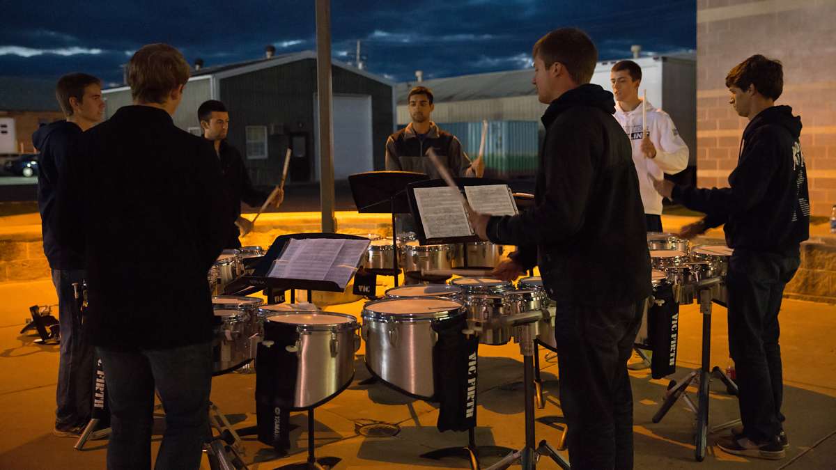 Members of the Penn State Blue Band percussion section rehearse before an upcoming home game. (Lindsay Lazarski/WHYY)