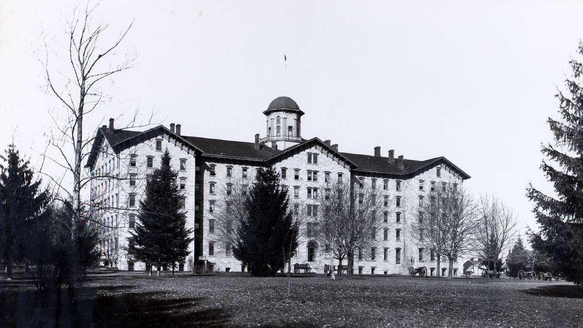 A view of the original Old Main known as 'Main Building' at Penn State circa 1863-1894. Made of limestone, the building was designed and constructed around the 1850’s. (Image courtesy of the Centre County Historical Society)