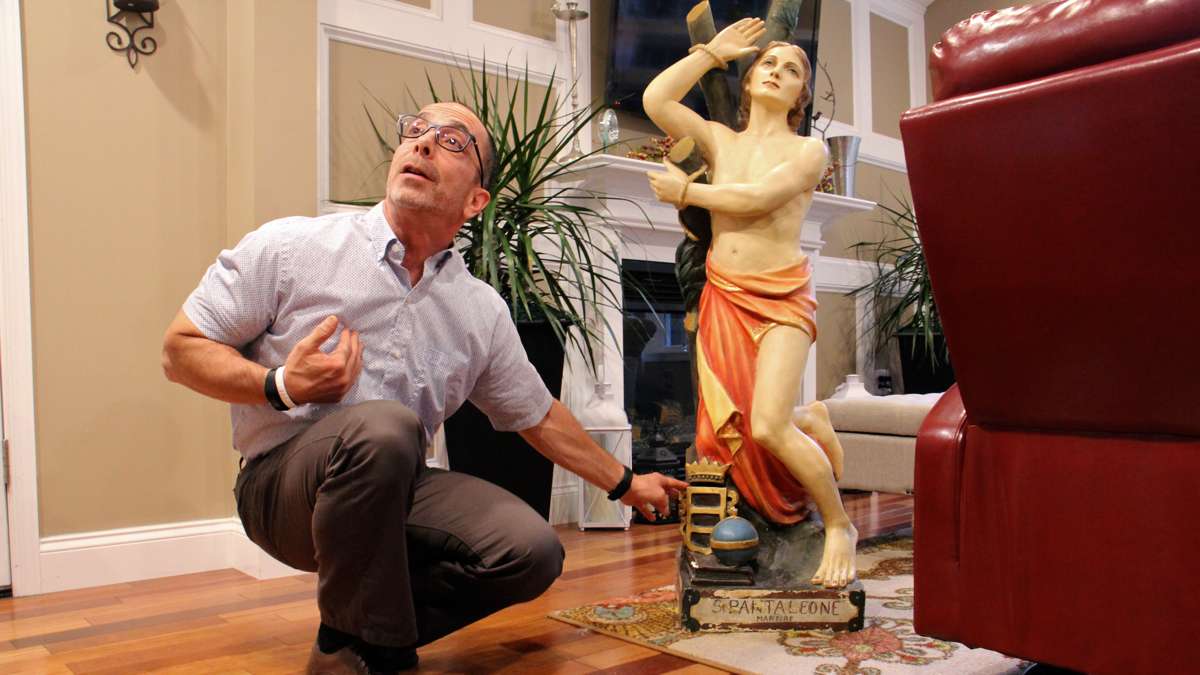 As a child, Ed Nader was frightened of the statue, which was kept in a walk-in closet in his grandmother's South Philadelphia row home. (Emma Lee/WHYY)