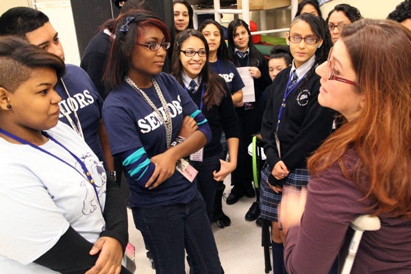 <p>Lead Teaching Artist Hannah Tsapatoris Macleod gives her students a pep talk after their first performance for a test audience. (Emma Lee/for NewsWorks)</p>
