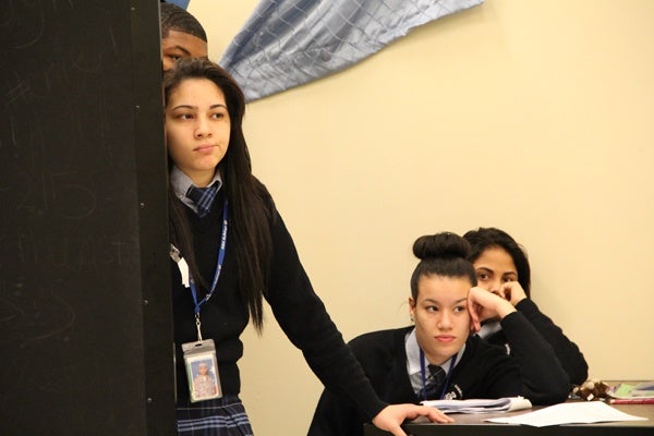 <p>Students Zulydivad Ortiz-Mendez, Natalie Morales and Anneska Maldonado, watch their classmates perform while they wait for their next scene. (Emma Lee/for NewsWorks)</p>
