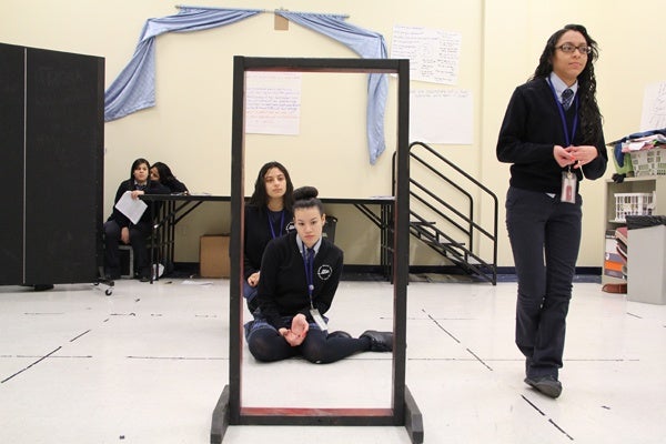 <p>Students, from right, Jennifer Melendez, Natalie Morales, and Samary Malave act out a vignette about body image as part of their Scene Work and Improvisation class at Mariana Bracetti Academy Charter school. (Emma Lee/for NewsWorks)</p>
