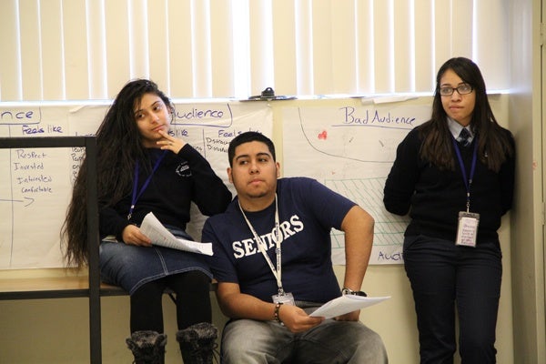 <p>Samary Malave, Onix Pagan and Jennifer Monserrat listen to instruction from lead teaching artist Hannah Tsapatoris Macleod. (Emma Lee/for NewsWorks)</p>
