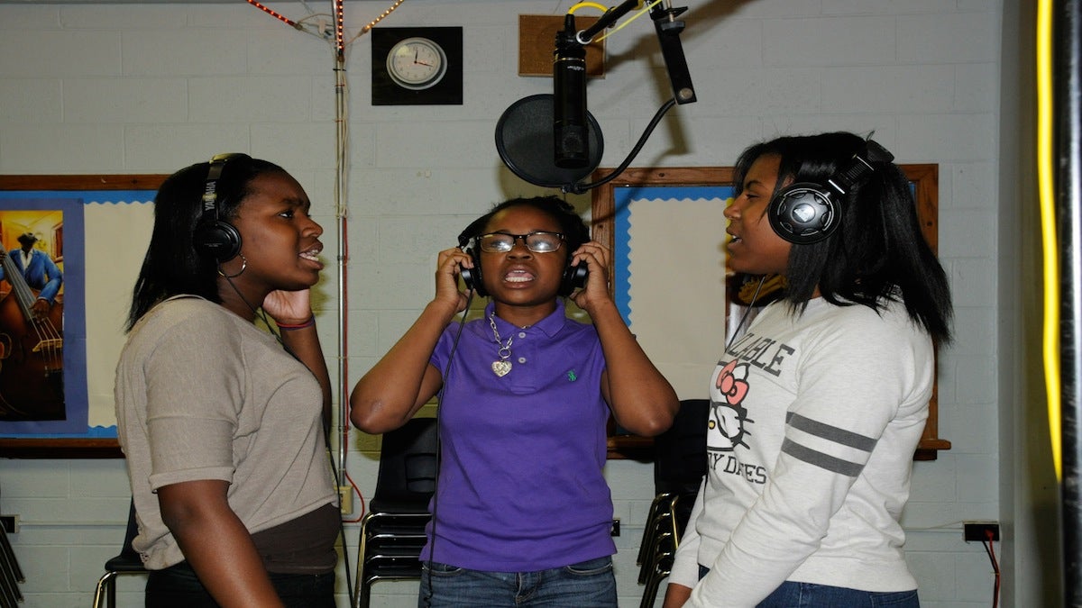  Three students from Houston School record an original song inside the school’s studio, Rural Lane Records, for the CD “Bully.