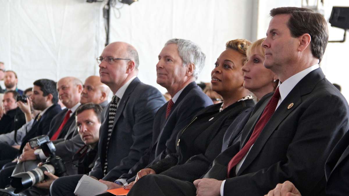 Government officials (from right) U.S. Rep Donald Norcross, Lt. Gov. Kim Guadagno, and Camden Mayor Dana Redd join Subaru of America President Thomas Doll and communications director Michael McHale during a groundbreaking ceremony for Subaru's new headquarters in Camden. (Emma Lee/WHYY)