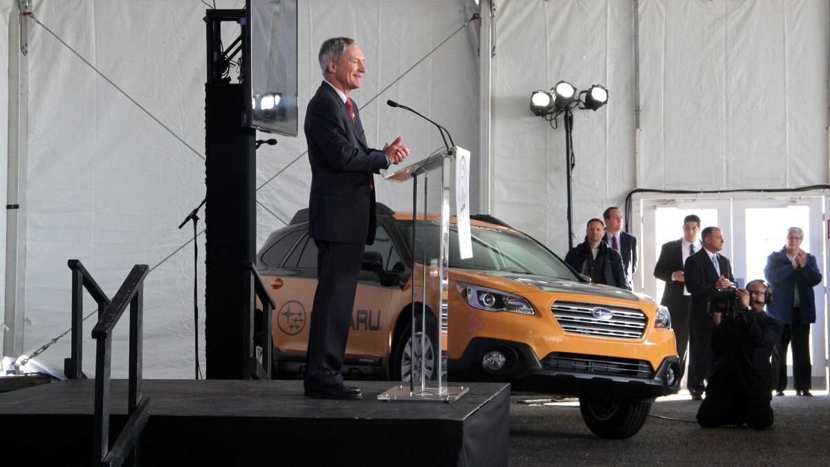 Subaru of America President Thomas Doll applauds his company's move to Camden during a groundbreaking ceremony.