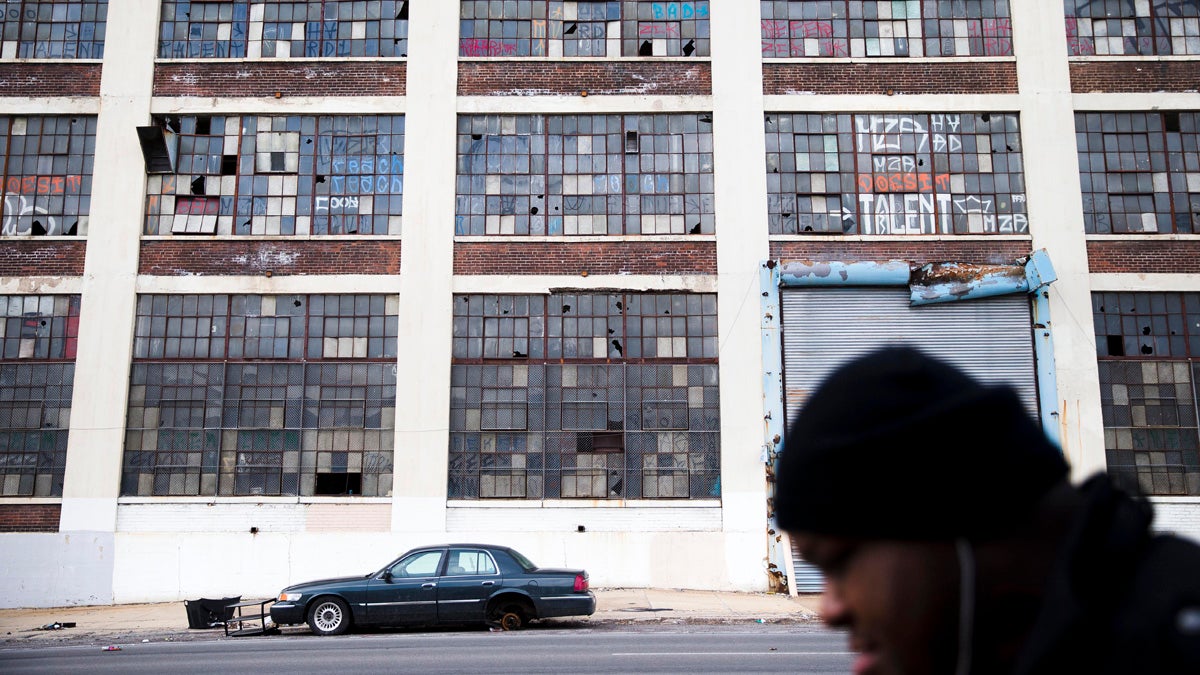  A person walks past a dilapidated building on a spring day in Philadelphia, Pennsylvania.  Aside from Philly, which remains the nation's fifth-largest city, the Commonwealth's biggest residential increases during the past few years occurred in suburban townships. (AP Photo/Matt Rourke) 