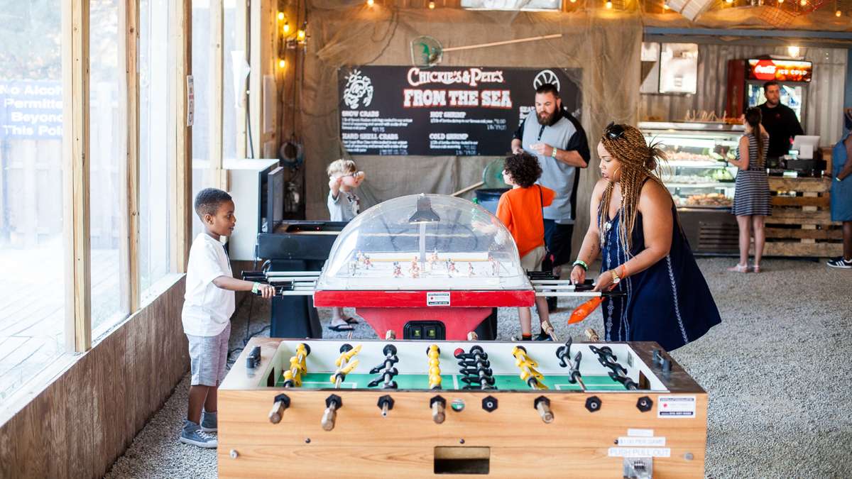 Foosball soccer and hockey games inside an air conditioned lodge at the River Rink at Penn's Landing.