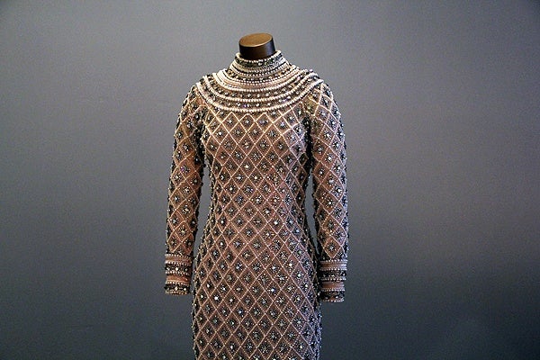 <p>A beaded dress worn when The Supremes met the Queen Mother of England in 1968 weighed about 30 pounds. (Emma Lee/for NewsWorks)</p>

