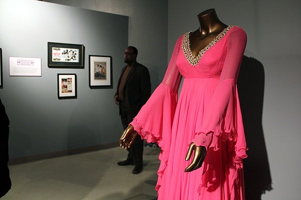 <p>Sullivan's Delight, a hot pink empire dress with bejeweled braided trim, was designed for a segment of the Ed Sullivan Show in 1967. (Emma Lee/for NewsWorks)</p>
