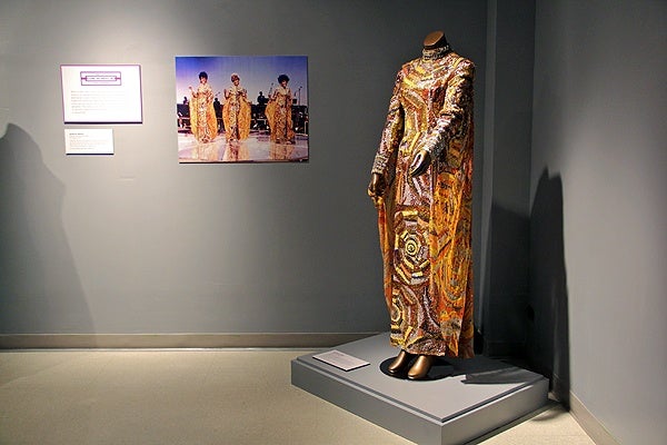 <p>Called butterfly gowns because of the large winglike capes attached to the arms, these are among the most recognized costumes of The Supremes. This one was designed by Michael Travis in 1968. (Emma Lee/for NewsWorks)</p>
