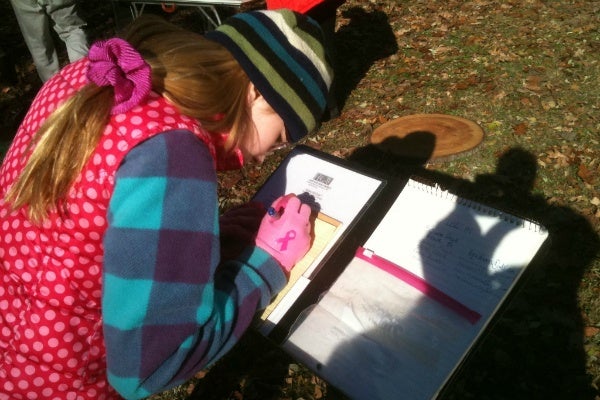 <p><p>Cushla Standefer records the time, place, and nature of an object she found in the logbook for the site. (Karl Biemuller/for NewsWorks)</p></p>
