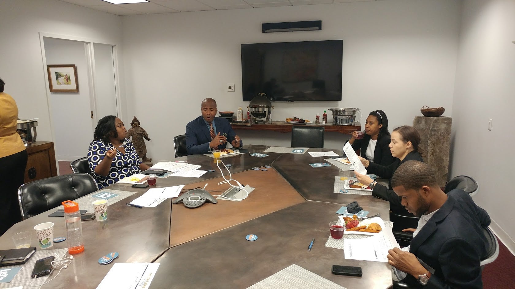  Young African-Americans discuss issues as part of the On the Table events Tuesday in Philadelphia. (Tom MacDonald/WHYY) 