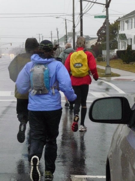 Rain forced runners to sport their rain gear during last year's race. The cold temperatures didn't help either during the run. (Photo courtesy of Steve Antczak)