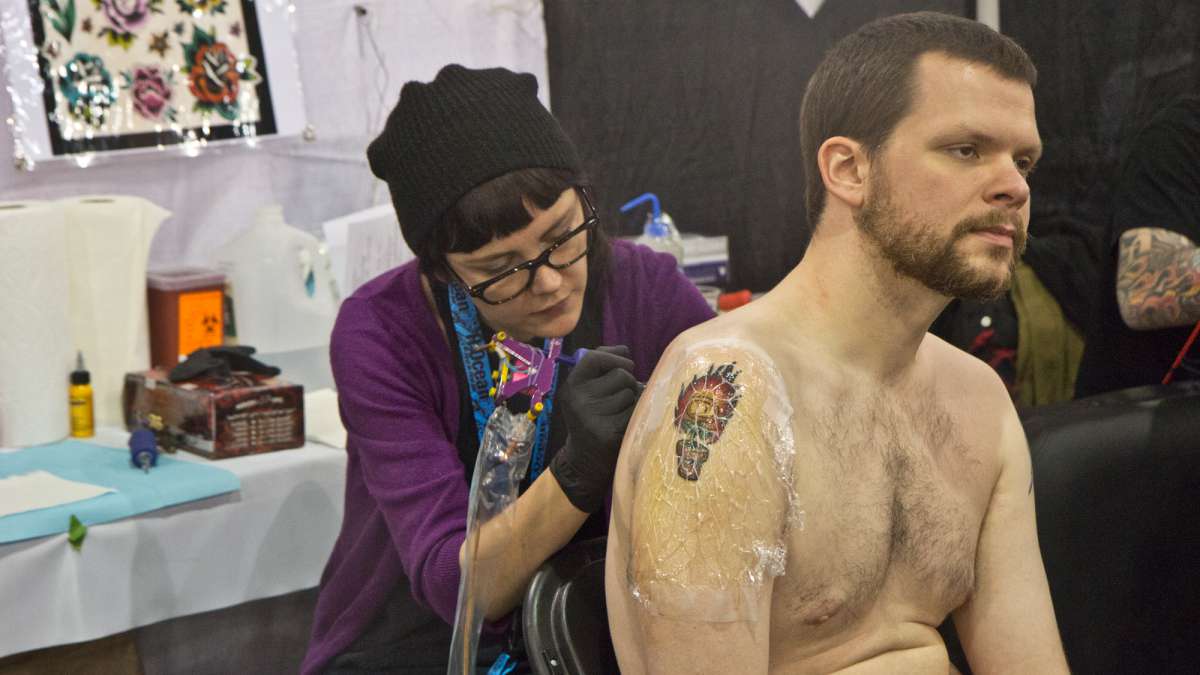 Kevin Stroman receives a laser gun on his back from Chanda Taylor because ‘it’s cool.’