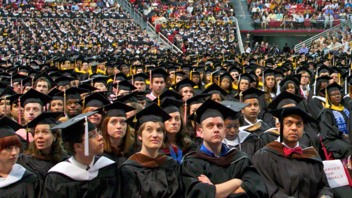 Temple University students are shown at a May 2012 graduation ceremony. Pennsylvania college students graduate owing an average of $36,193.(Nathaniel Hamilton/for WHYY) 