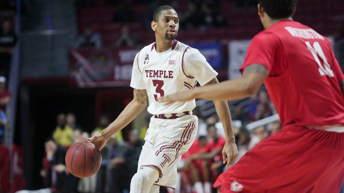 Temple's Jesse Morgan dribbles against Houston's JC Washington Thursday, February 23, 2015 at the Liacouras Center. Temple won 66-54. Morgan finished with 10 points in 25 minutes of play. Kevin Cook / for NewsWorks.