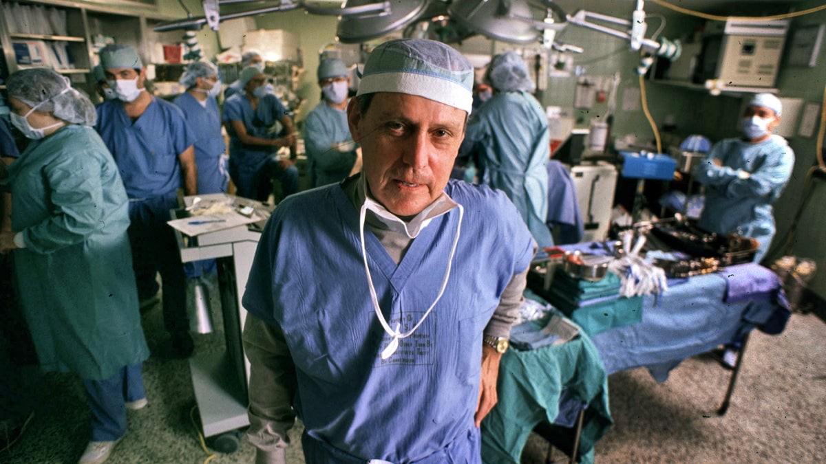  Transplant pioneer Dr. Thomas Starzl is shown on Nov. 10, 1989, overseeing a liver transplant operation at the University of Pittsburgh Medical Center. Starzl died at the age of 90 on March 4 at his home in Pittsburgh. (AP Photo/Gene J. Puskar/File) 