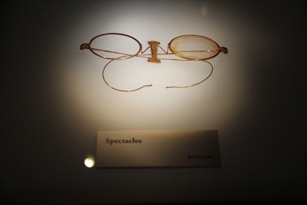 A pair of glasses recovered from the wreck of the titanic is on display at the Franklin Institute. (Emma Lee/for NewsWorks)