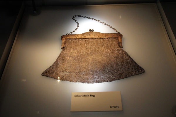 A silver mesh hadbag is one of many delicate items that survived a journey to the ocean floor with the Titanic. More than 300 objects recovered from the wreck are on display at the Franklin Institute. (Emma Lee/for NewsWorks)