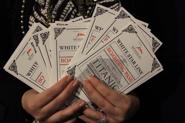 Each visitor to the Franklin Institute's new Titanic exhibit receives a boarding pass containing information about a real passenger. (Emma Lee/for NewsWorks)