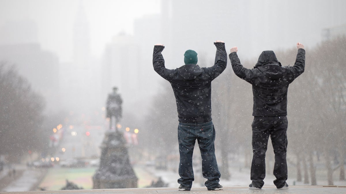  During a winter storm tourists imitate the character Rocky Balboa on the steps of the Philadelphia Museum of Art in Philadelphia, Pa. Philadelphia will host the Democratic National Convention in 2016. (AP Photo/Matt Rourke) 