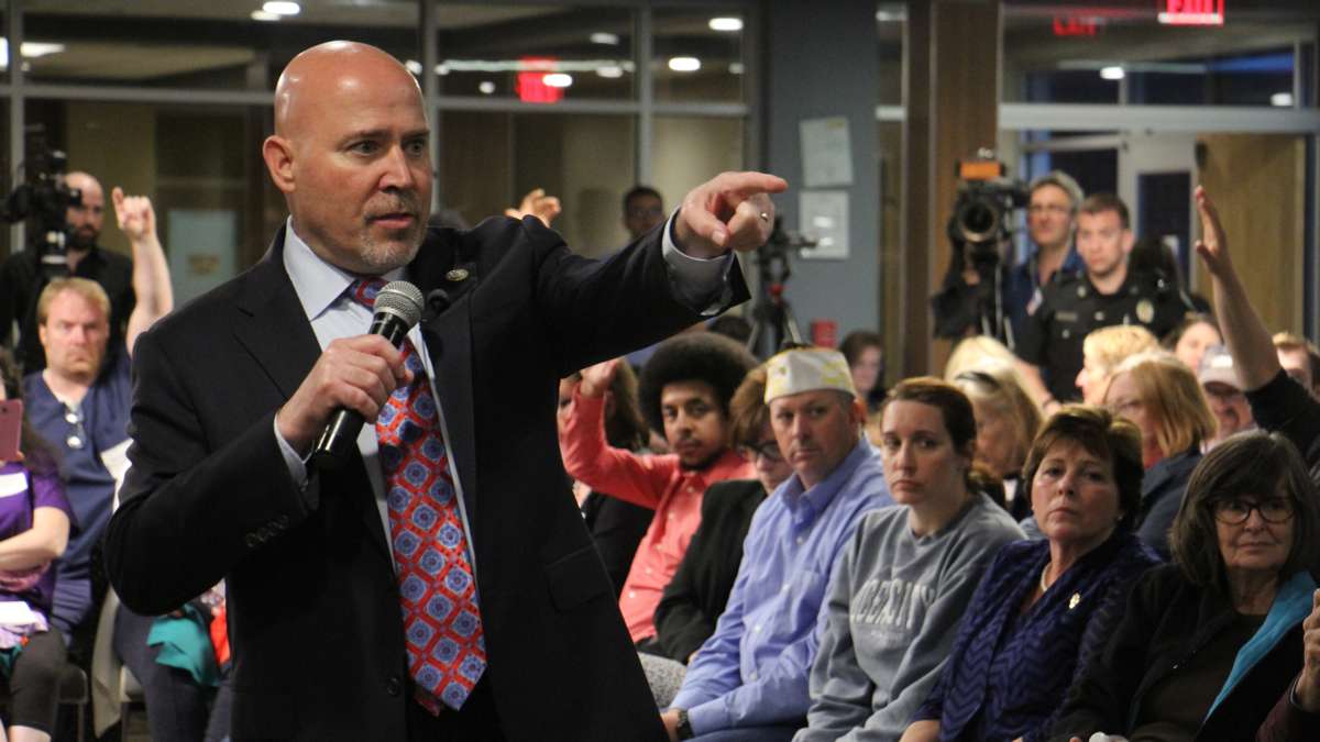 New Jersey Congressman Tom MacArthur faces a tough crowd in Willingboro earlier this month, taking questions about health care, the president's tax returns, and investigations into connections between the White House and Russia.