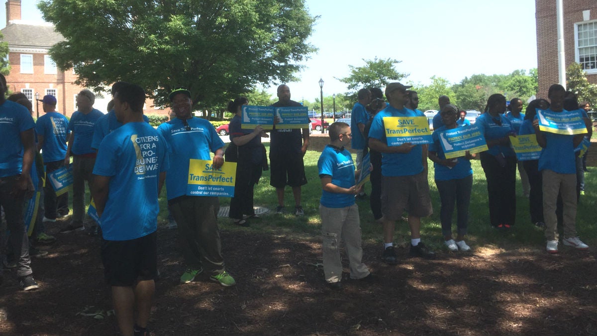  Supporters of a bill that would prevent the sale of TransPerfect gather outside Legislative Hall in Dover on Wednesday. (Zoë Read/WHYY) 