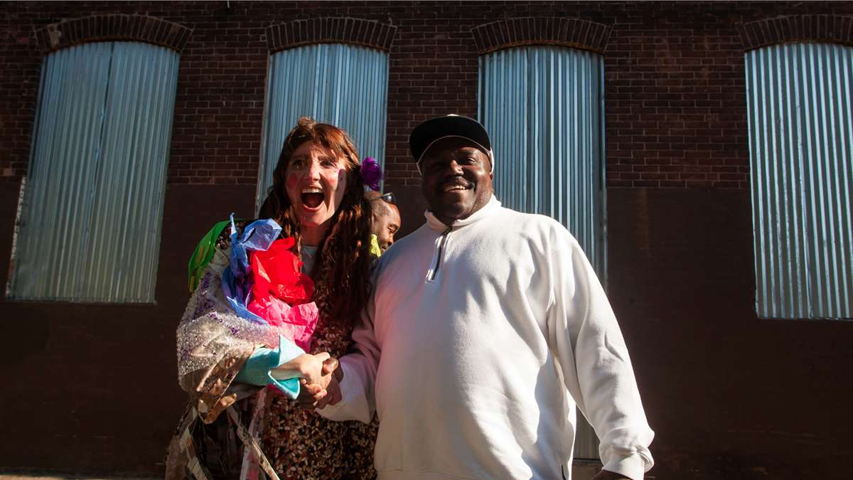 Steve Scott of Philadelphia Streets Department gets a warm welcome at Happy Trash Day. (Brad Larrison/for NewsWorks)