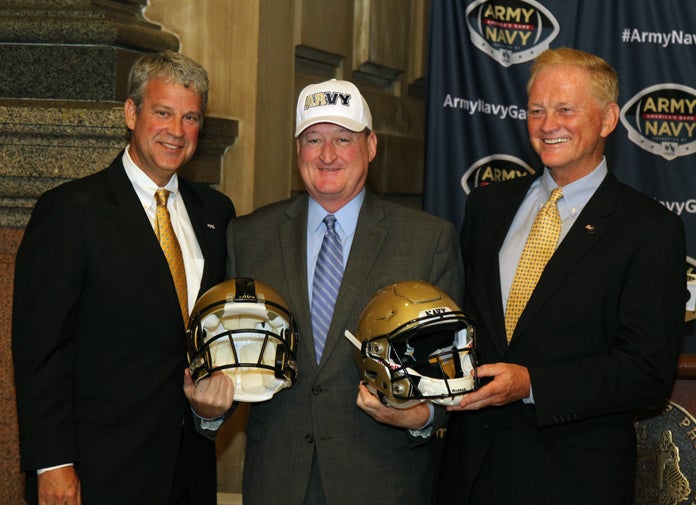  Athletic Directors of the two academy's stand with Mayor Jim Kenney and his unique hat (Tom MacDonald/WHYY) 