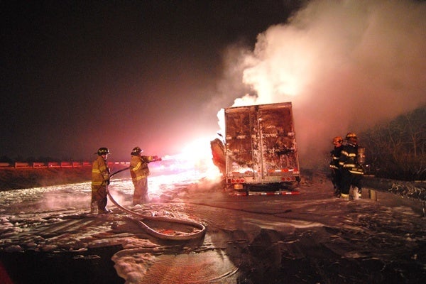 <p><p>Fire fighters battled the stubborn truck fire along the side of the highway in the early Monday morning hours. (John Jankowski/for NewsWorks)</p></p>
