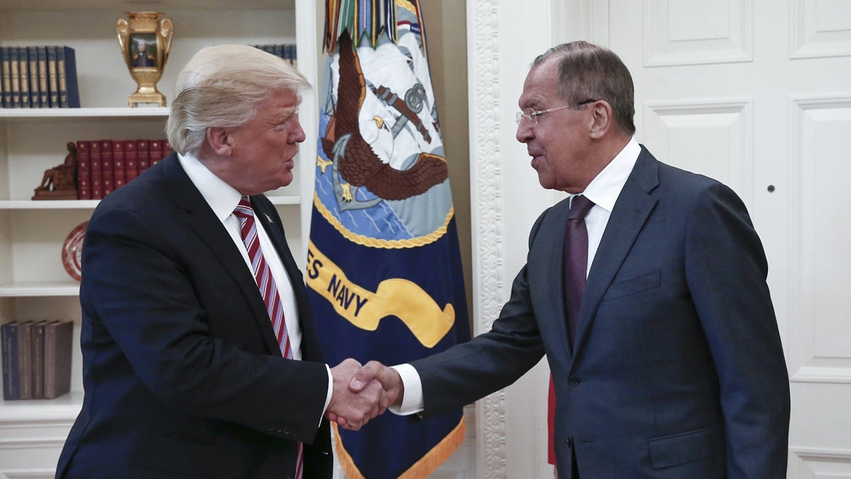  U.S. President Donald Trump, left, shakes hands with Russian Foreign Minister Sergey Lavrov in the White House in Washington on Wednesday. (Russian Foreign Ministry Photo via AP) 