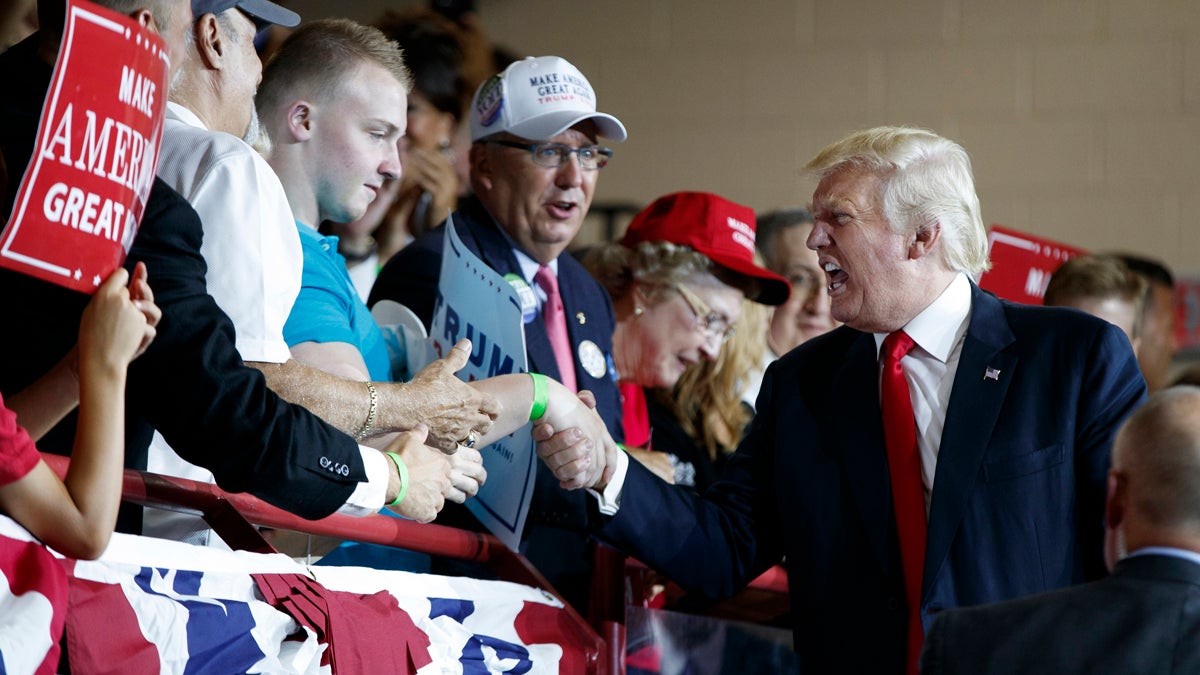  Republican presidential candidate Donald Trump shakes hands during a campaign rally at Cumberland Valley High School, Monday, Aug. 1, 2016, in Mechanicsburg, Pa. (AP Photo/Evan Vucci) 