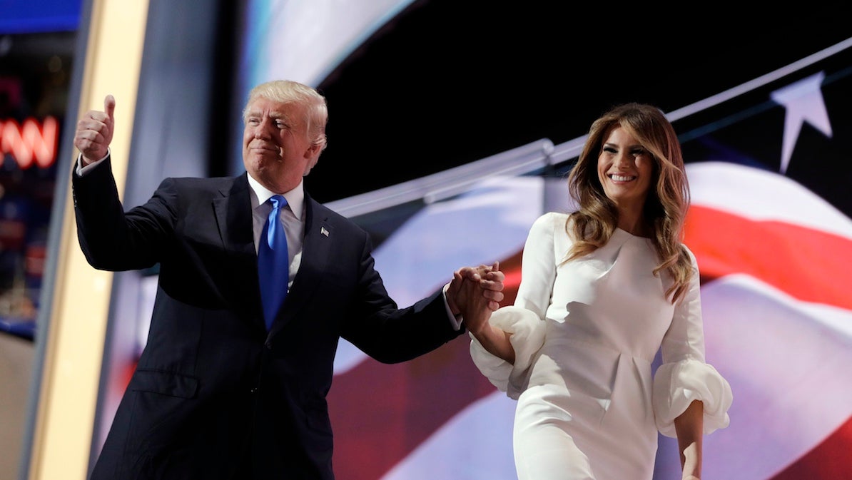 Republican presidential candidate Donald Trump gives his thumb up as he walks off the stage with his wife Melania during the Republican National Convention