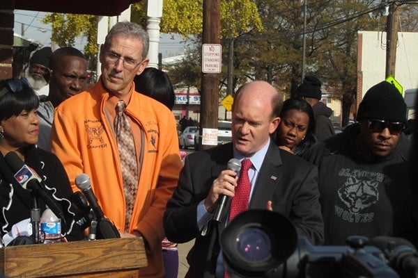 <p><p>Senator Chris Coons talks to the crowd alongside Wilmington City Councilman Kevin Kelley.  (Mark Eichmann/WHYY)</p></p>
