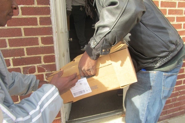 <p><p>Boxes loaded with turkeys are delivered to NOR Enterprises building in Wilmington before being distributed. (Mark Eichmann/WHYY)</p></p>
