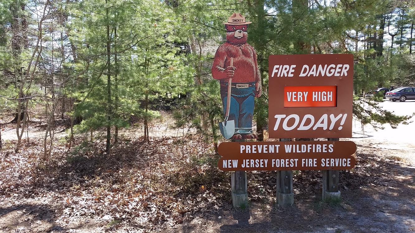  A fire risk status sign in Berkeley Township's Double Trouble State Park. (Image: Erik Weber)  