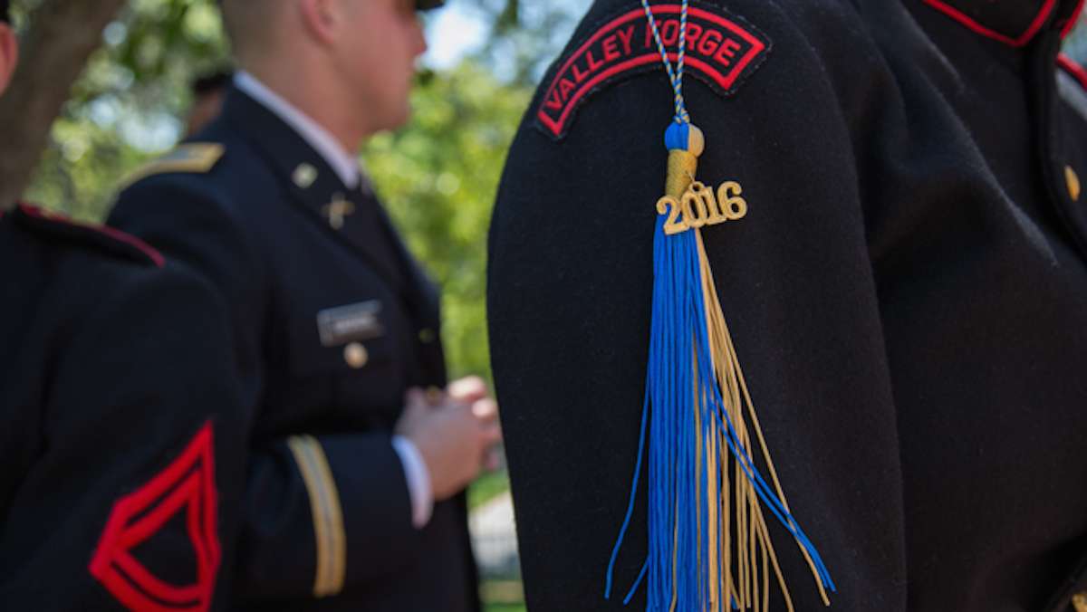 Cadets from the Valley Forge Military College hang their commencement tassels from their uniforms at their graduation, May 20, 2016.