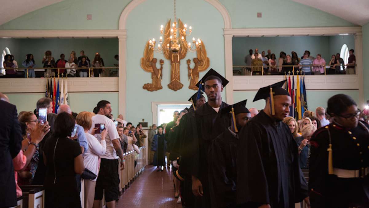 Graduates of the 2016 class at Valley Forge Military College file into the Alumni Memorial Chapel for their graduation ceremony, May 20, 2016. (Emily Cohen for NewsWorks)