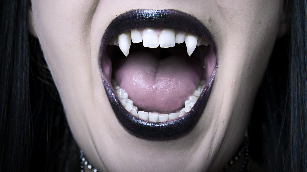  (Katalinks/<a herf='http://www.bigstockphoto.com/image-22811183/stock-photo-opened-vampire-woman-mouth-closeup'>Big Stock Photo</a>) 