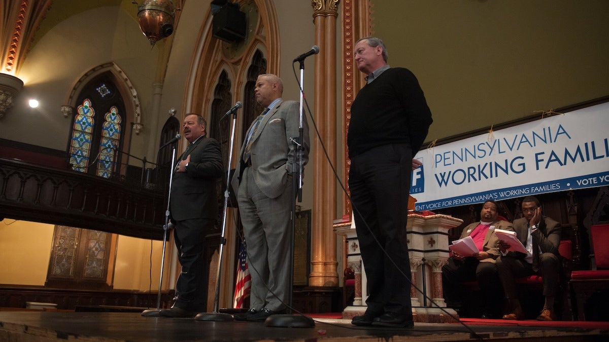 Candidates for mayor (from left) Nelson Diaz, Anthony Williams, and James Kenney share their views Saturday afternoon during a mayoral candidate forum organized by Pennsylvania Working Families Organization at the Arch Street United Methodist Church in center city. Behind them are the emcee, Bishop Dwayne D. Royster, and candidate Doug Oliver, right.