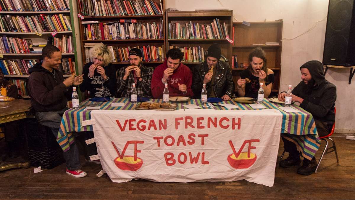 Eaters compete to win a haircut and free food at the 3rd annual Vegan French Toast Bowl at Lava Space in West Philadelphia.