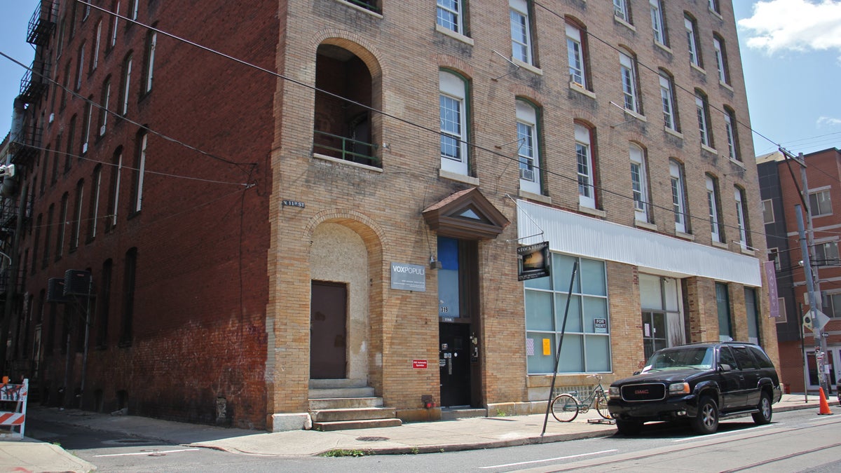  The artists' studio and gallery space on North 11th Street, known as the Vox building, has been shuttered by a fire that broke out in a stairwell. (Emma Lee/WHYY) 