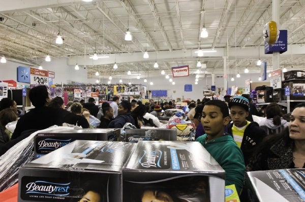 <p><p>Shoppers wait along a center aisle of bedding for 8 p.m. when the deals begin. (Kimberly Paynter/for NewsWorks)</p></p>
