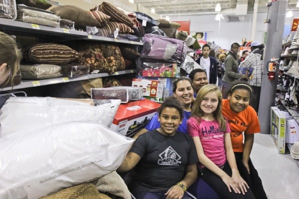 <p><p>Danielle Dussinger, her son, daughters and niece come to Walmart every Thanksgiving, have a blast and "get to stay up late." (Kimberly Paynter/for NewsWorks)</p></p>
