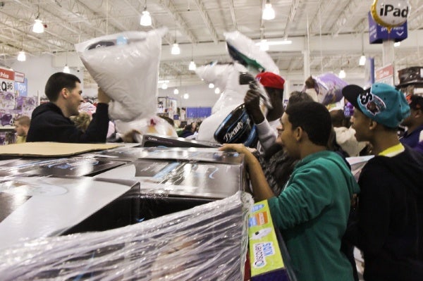 <p><p>At 8 p.m. employees all over the Walmart release the merchandise by signaling to frenzied shoppers. (Kimberly Paynter/for NewsWorks)</p></p>

