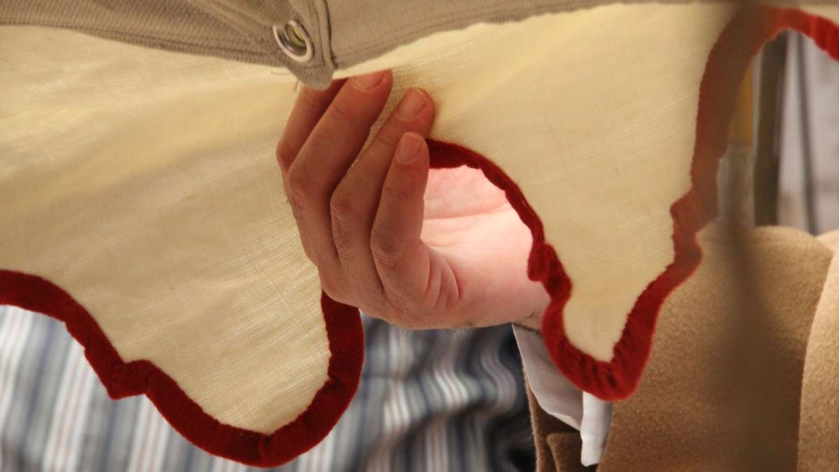 The linen was hand woven and the trim is sewn by hand on the museum's reproduction of George Washington's command tent. (Emma Lee/for NewsWorks)